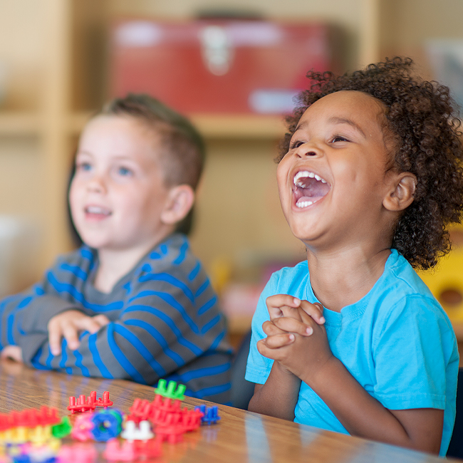 Elementary school children having fun in the classroom