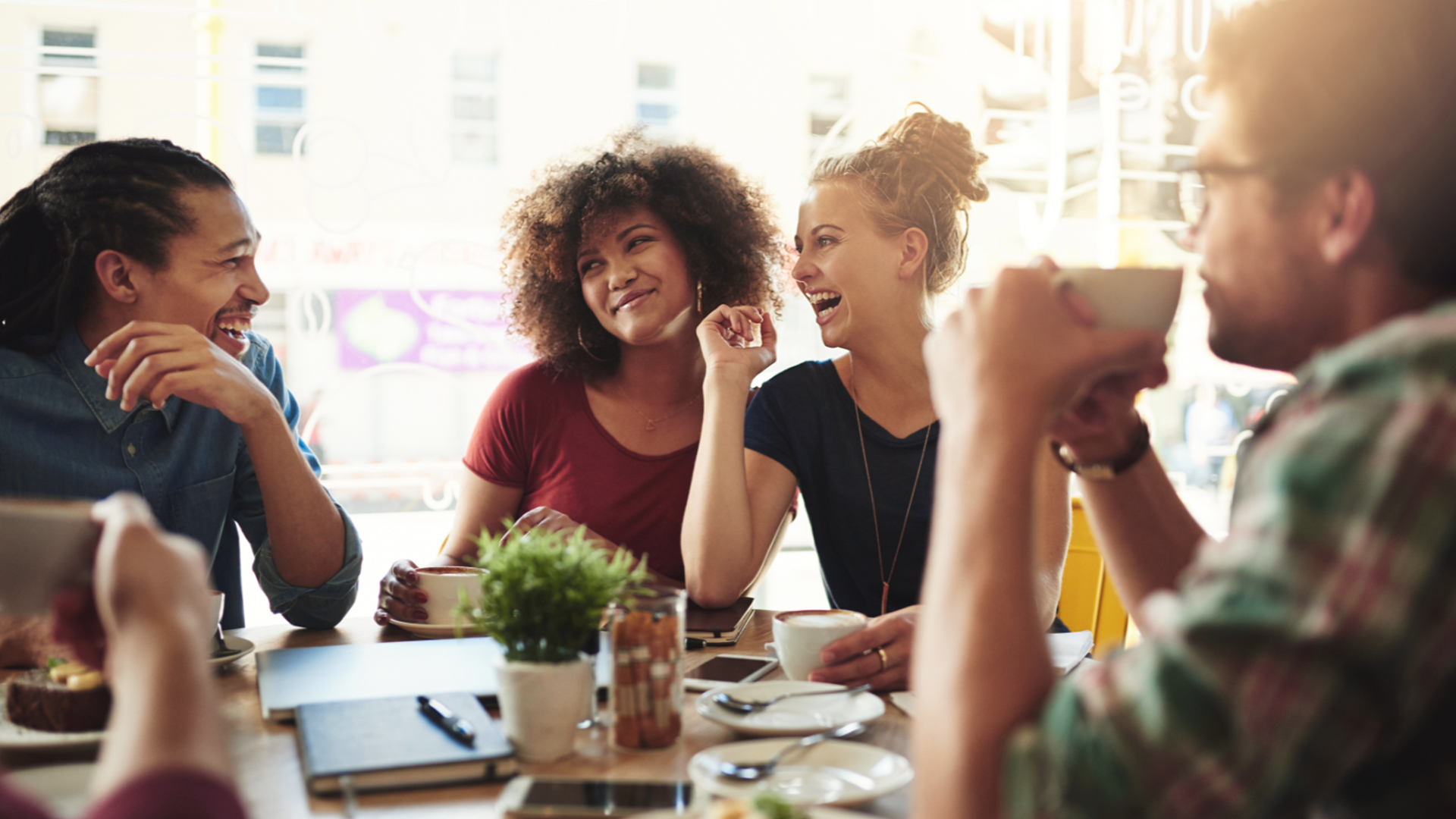 A group of friends enjoy coffee on the Central Coast.