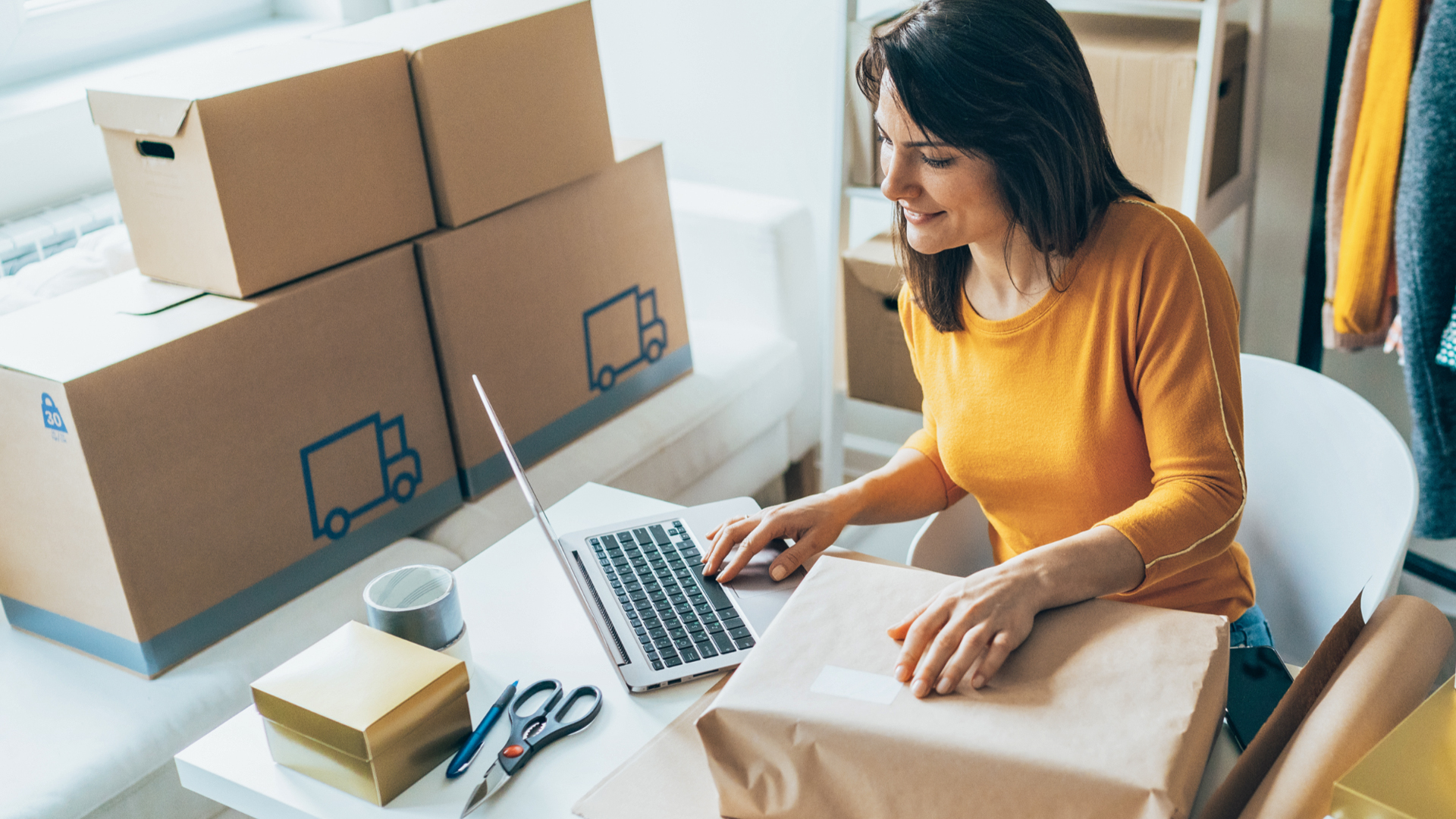 A business woman uses SESLOC's online banking platform.