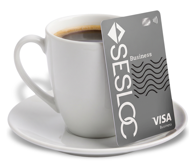 visa card and coffee cup